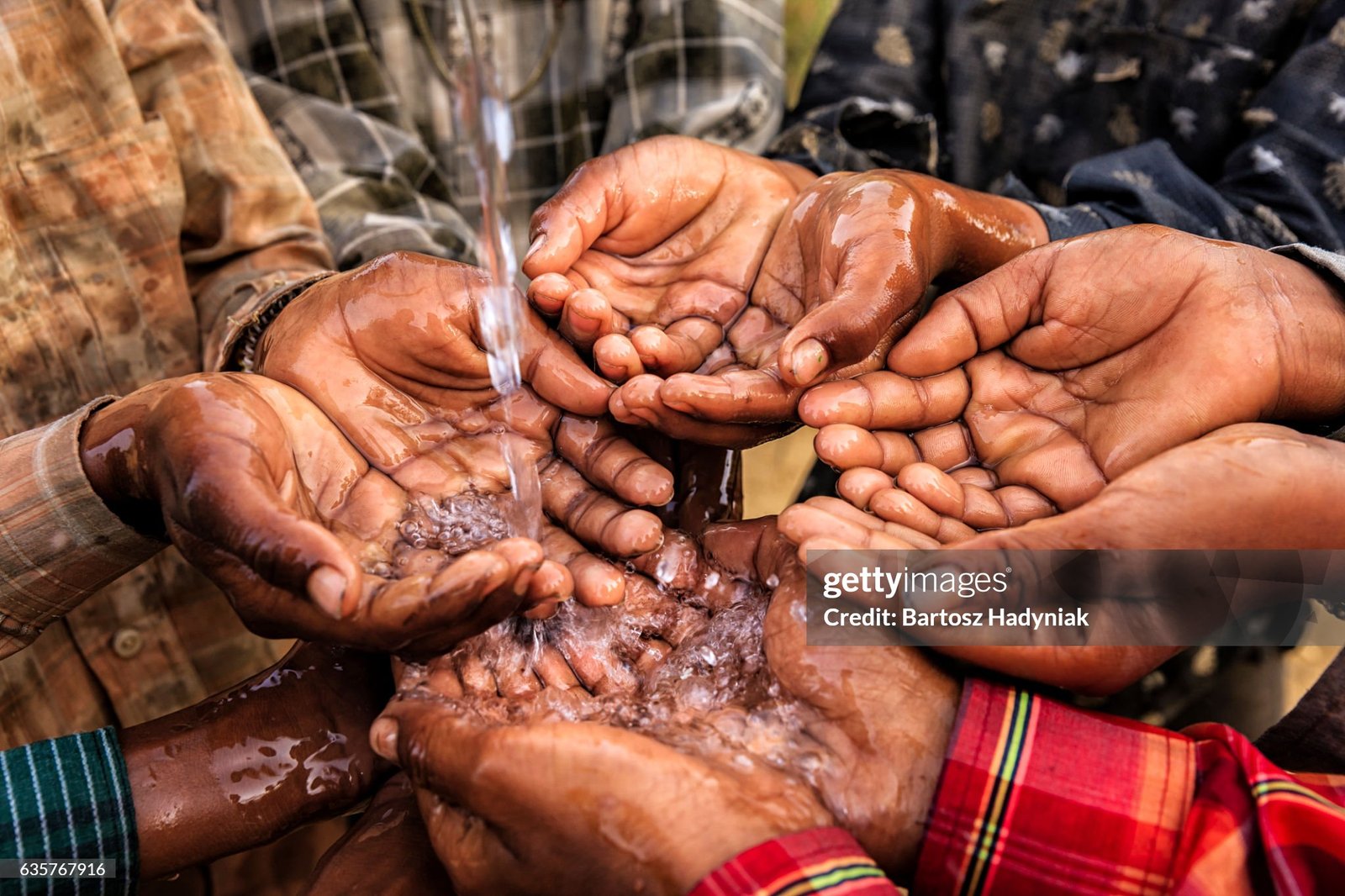 poor indian children keeping their hands up and asking for support.